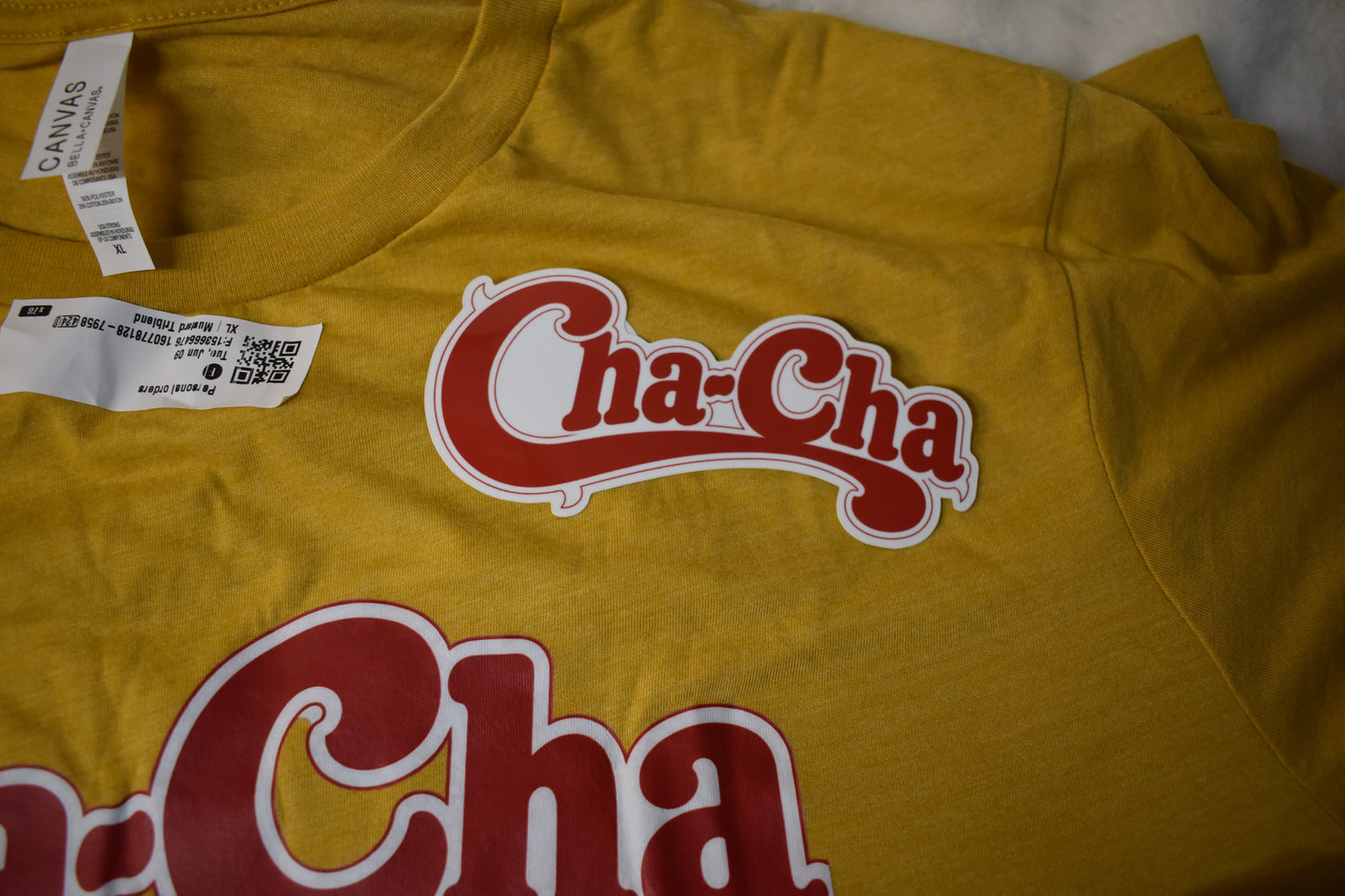Cha-Cha Overstock Package – Unisex T-Shirt, Cha-Cha Vinyl Sticker, and Free Pig
